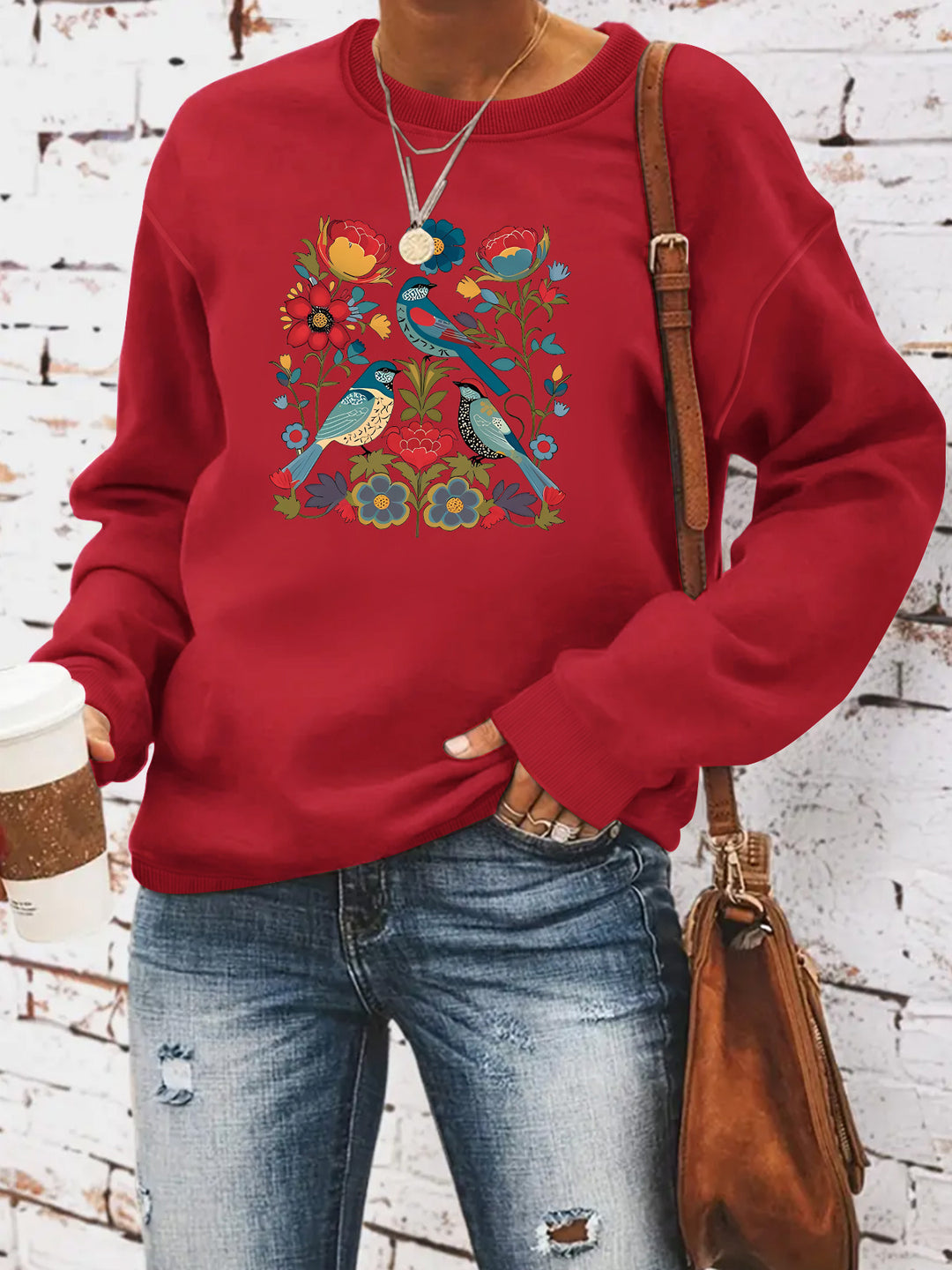 Kvinnors sweatshirt med blommigt fågelmotiv och avslappnad passform Mirla-Eva Jonsson