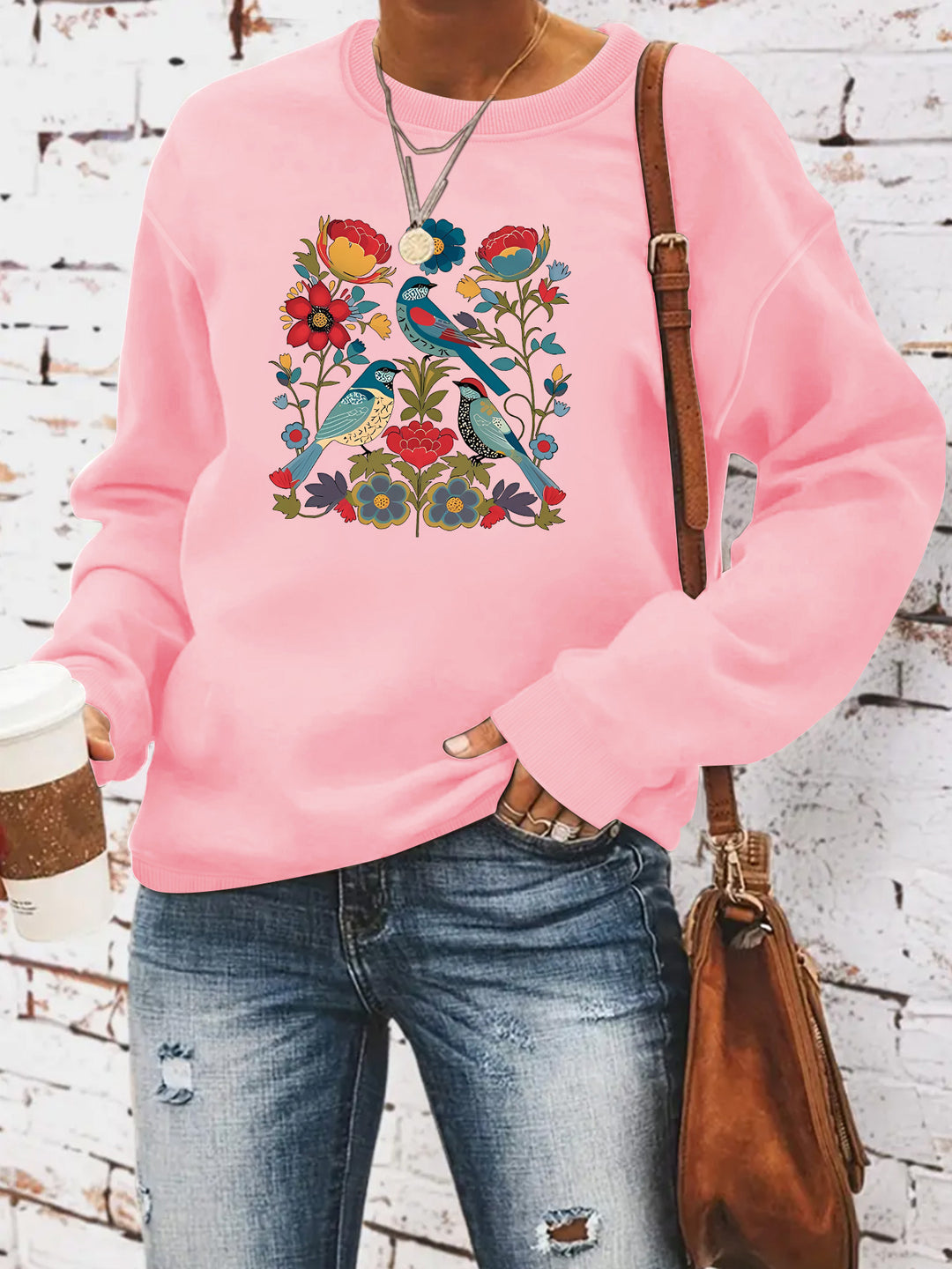 Kvinnors sweatshirt med blommigt fågelmotiv och avslappnad passform Mirla-Eva Jonsson
