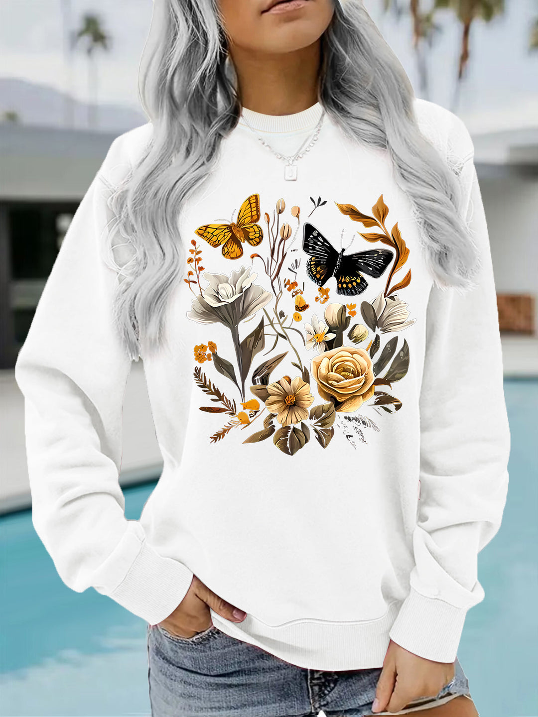 Kvinnors sweatshirt med blommönster och avslappnad passform Mirla-Eva Jonsson