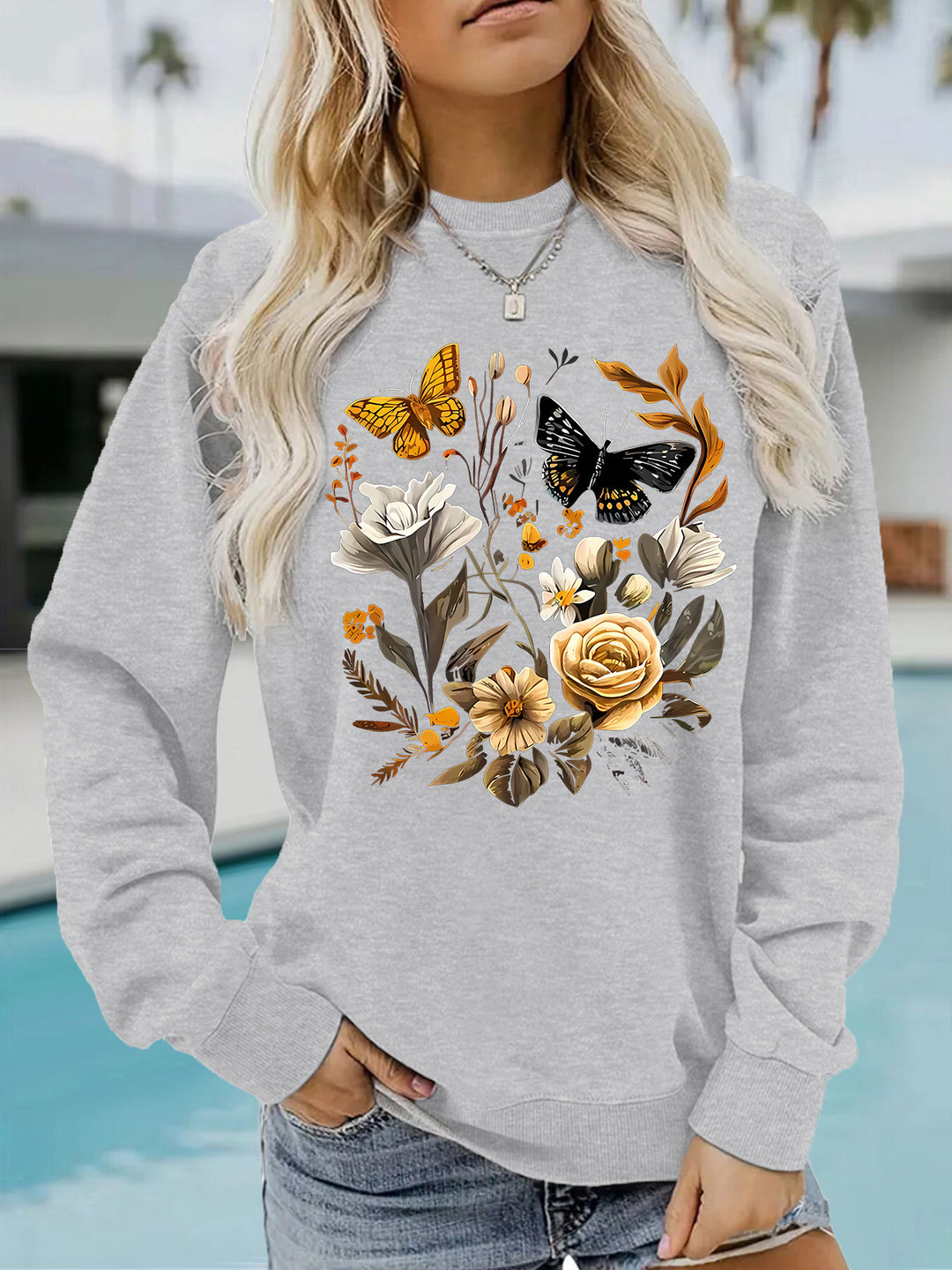 Kvinnors sweatshirt med blommönster och avslappnad passform Mirla-Eva Jonsson