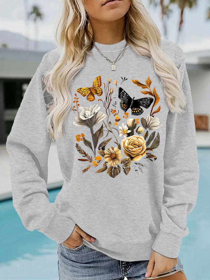 Kvinnors sweatshirt med blommönster och avslappnad passform Mirla-Eva Jonsson