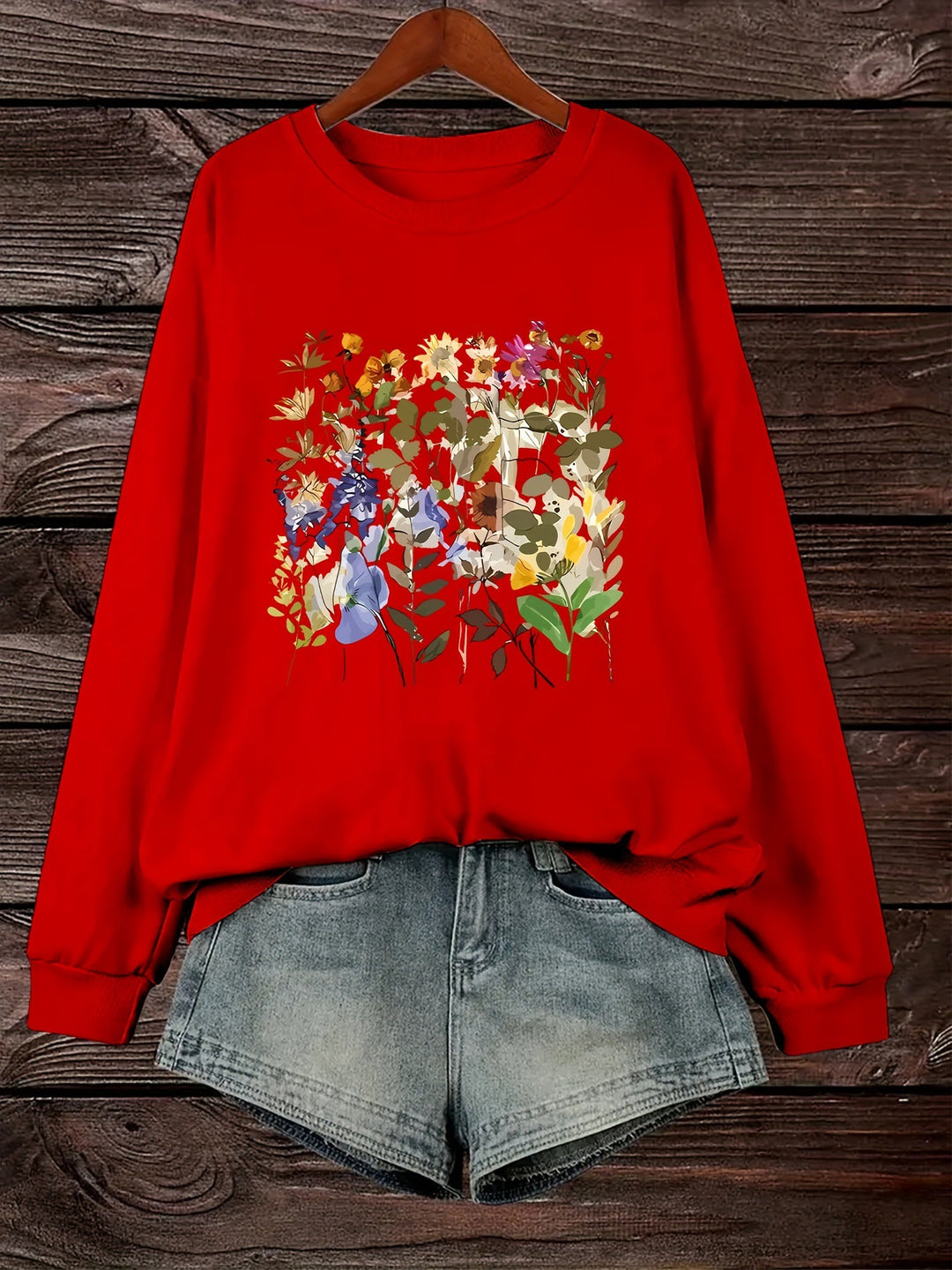 Kvinnors sweatshirt med blommönster och bekväm passform Mirla-Eva Jonsson