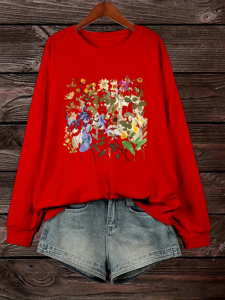 Kvinnors sweatshirt med blommönster och bekväm passform Mirla-Eva Jonsson