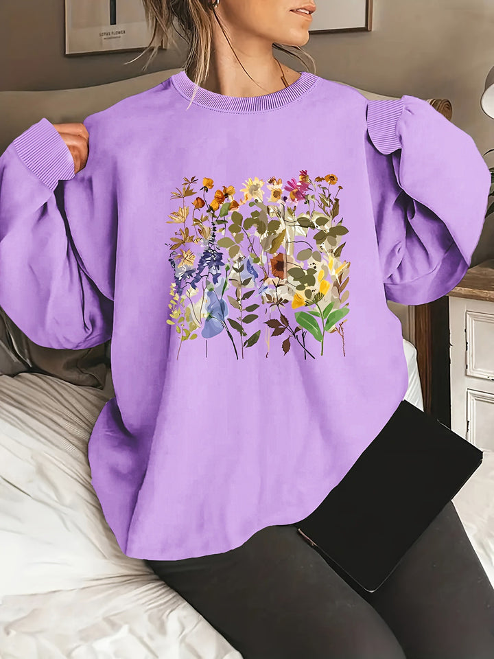 Kvinnors sweatshirt med blommönster och bekväm passform Mirla-Eva Jonsson