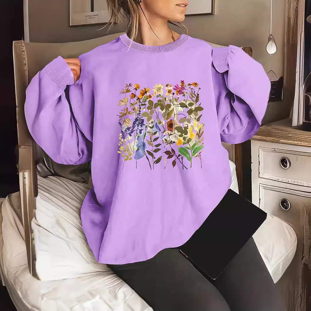 Kvinnors sweatshirt med blommönster och bekväm passform Mirla-Eva Jonsson