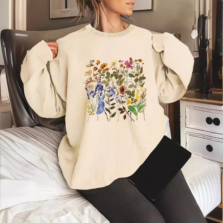 Kvinnors sweatshirt med blommönster och bekväm passform Mirla-Eva Jonsson