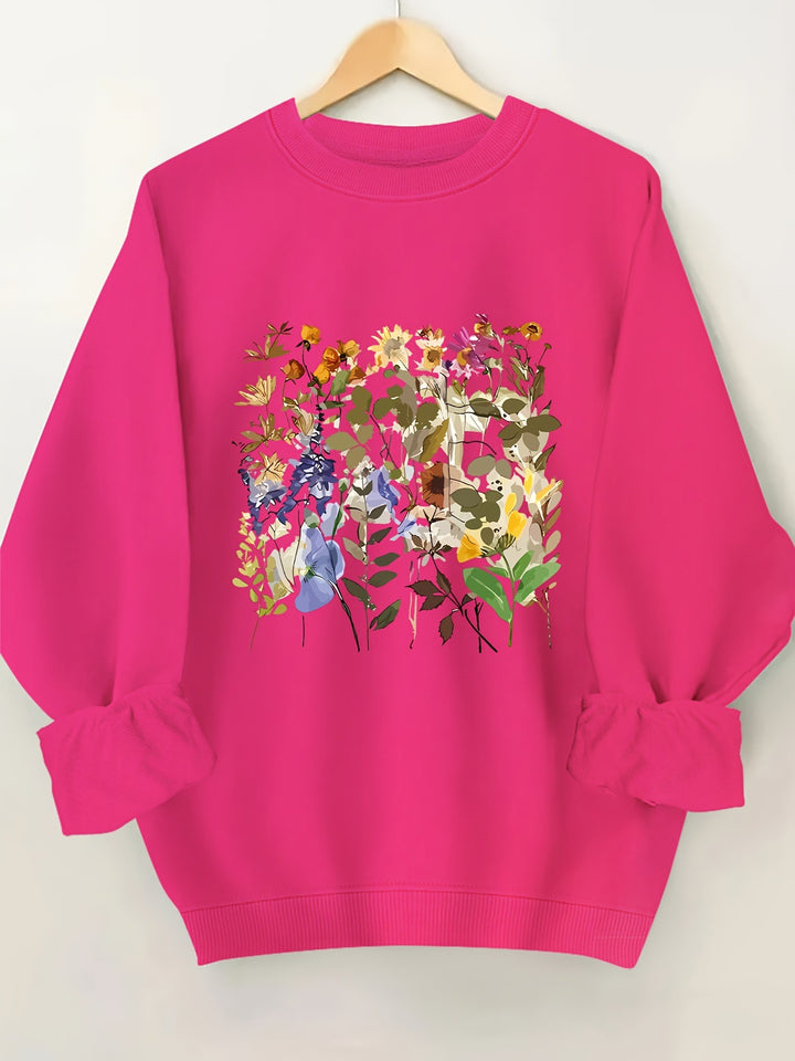 Kvinnors sweatshirt med blommönster och bekväm passform Mirla-Eva Jonsson