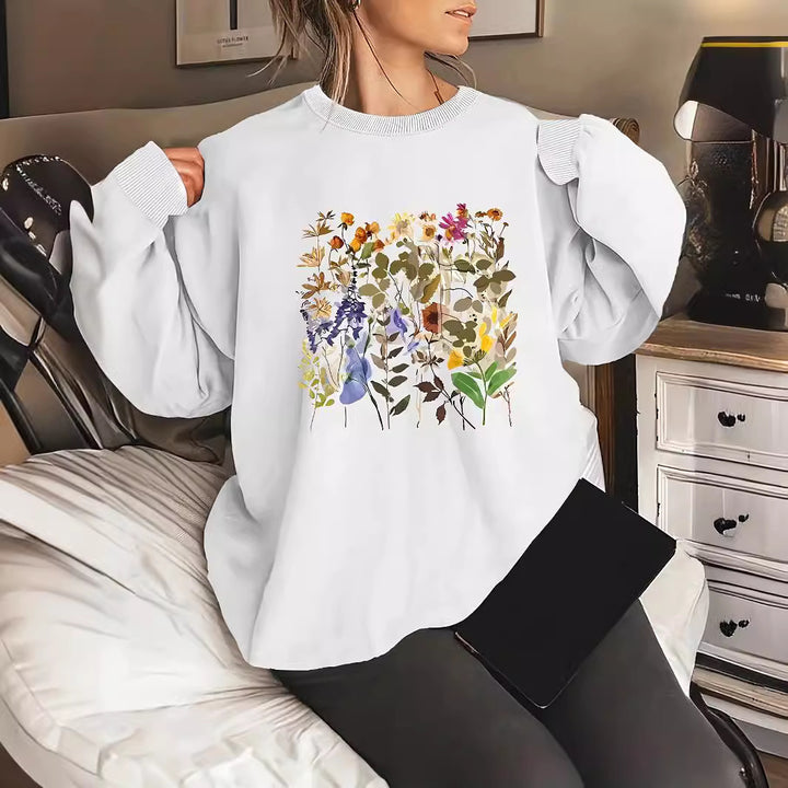 Kvinnors sweatshirt med blommönster och bekväm passform Mirla-Eva Jonsson