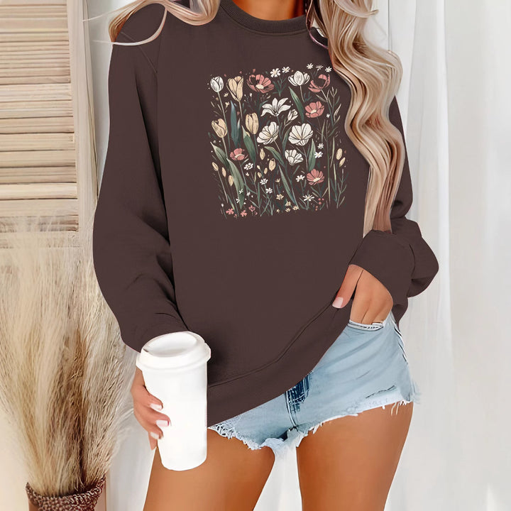 Kvinnors sweatshirt med blommotiv och avslappnad passform Mirla-Eva Jonsson