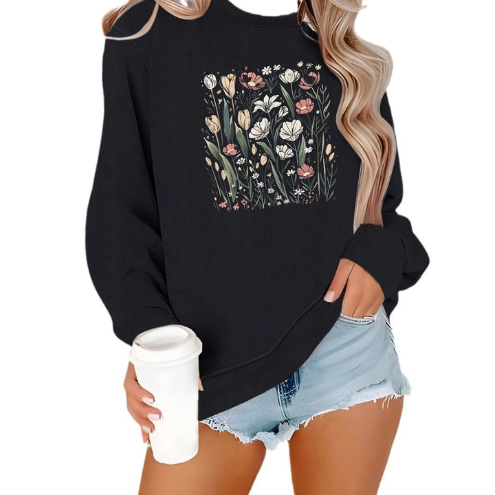 Kvinnors sweatshirt med blommotiv och avslappnad passform Mirla-Eva Jonsson