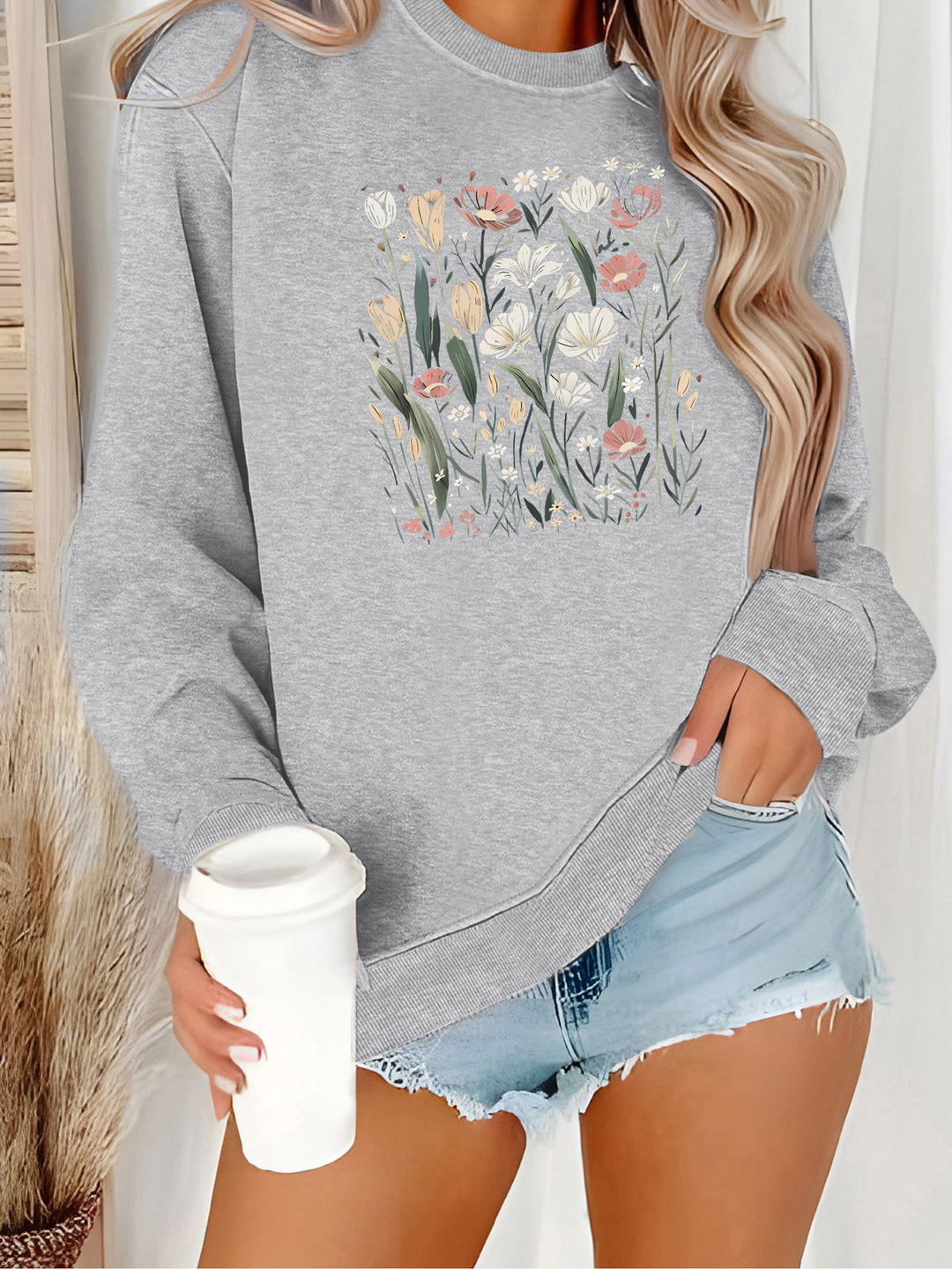 Kvinnors sweatshirt med blommotiv och avslappnad passform Mirla-Eva Jonsson