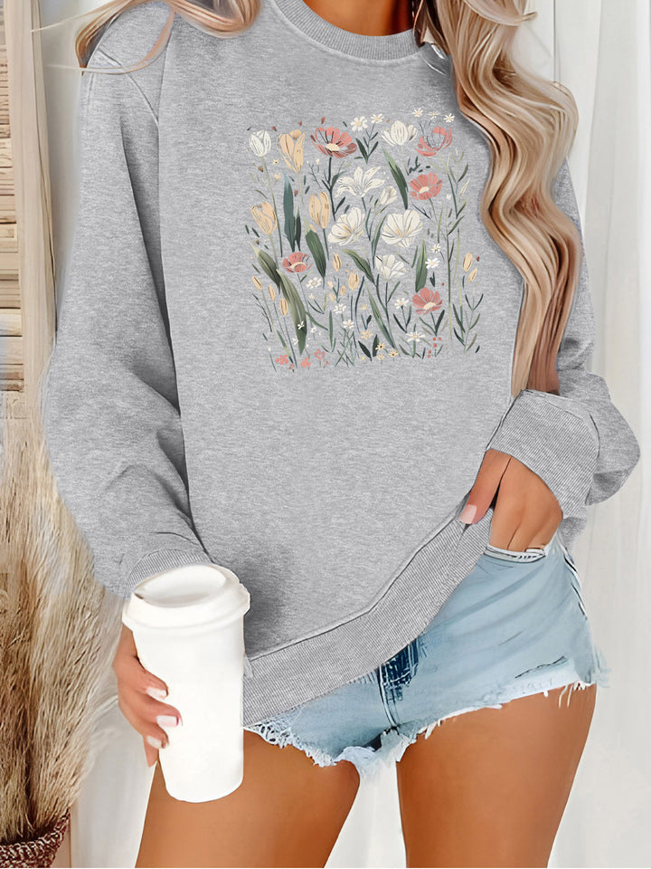 Kvinnors sweatshirt med blommotiv och avslappnad passform Mirla-Eva Jonsson