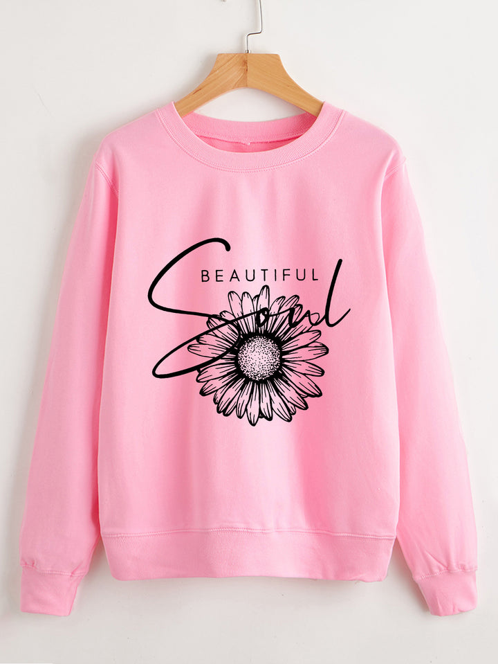 Kvinnors sweatshirt med blommotiv och inspirerande text Mirla-Eva Jonsson
