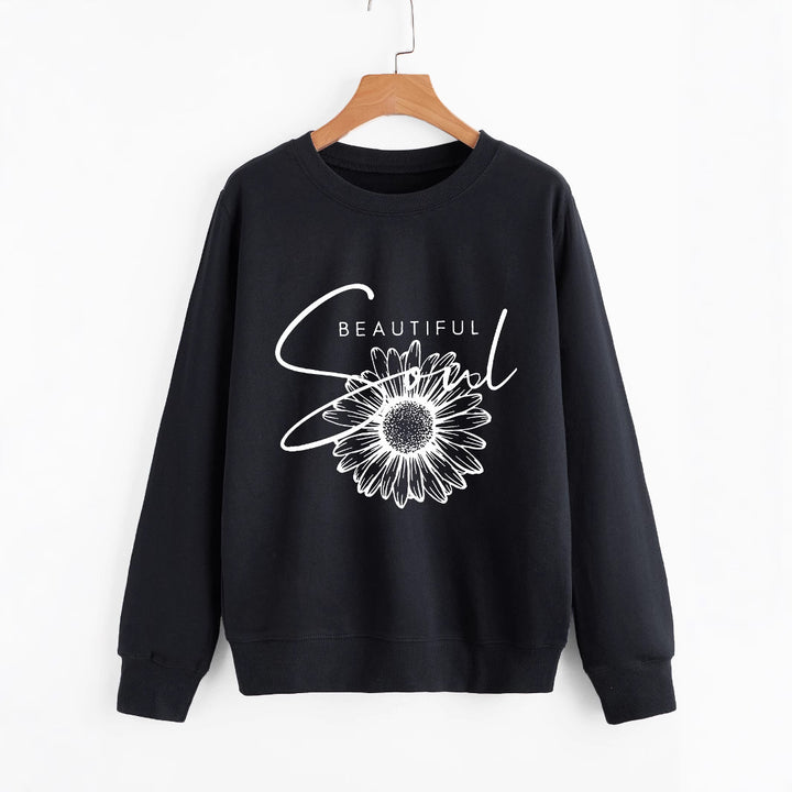 Kvinnors sweatshirt med blommotiv och inspirerande text Mirla-Eva Jonsson
