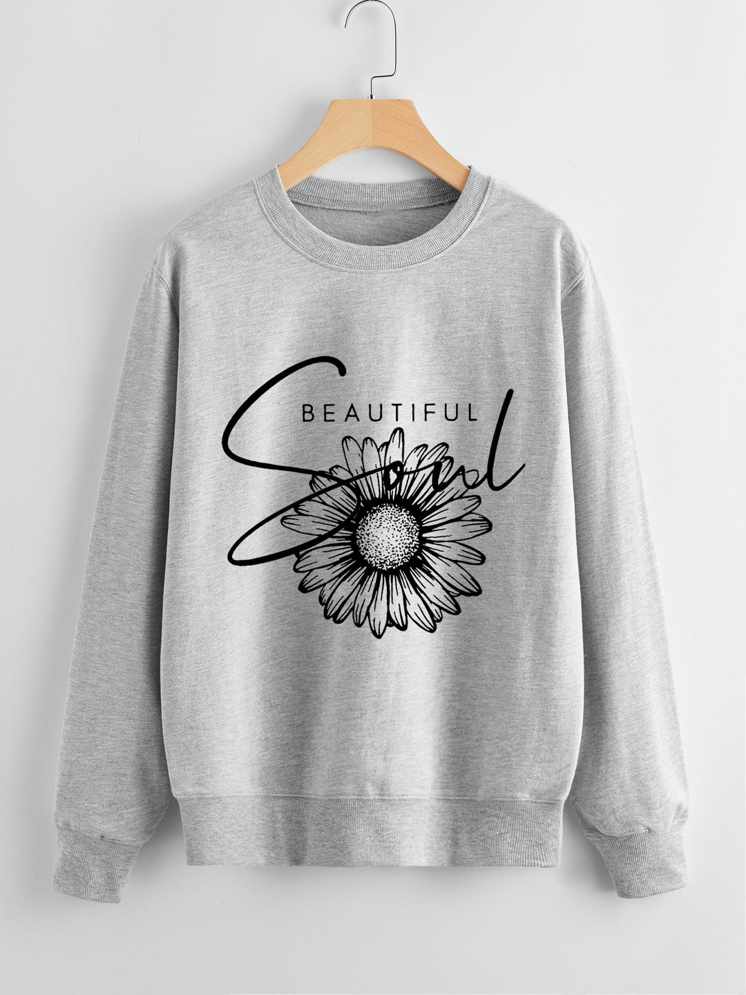 Kvinnors sweatshirt med blommotiv och inspirerande text Mirla-Eva Jonsson
