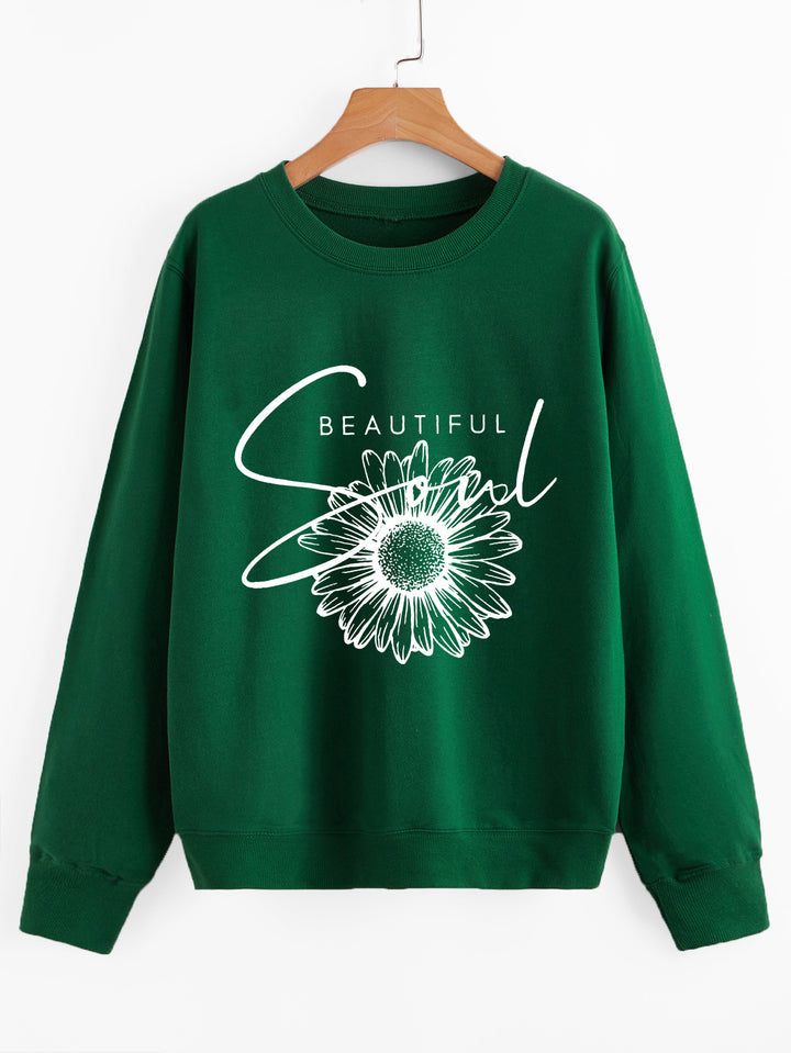 Kvinnors sweatshirt med blommotiv och inspirerande text Mirla-Eva Jonsson