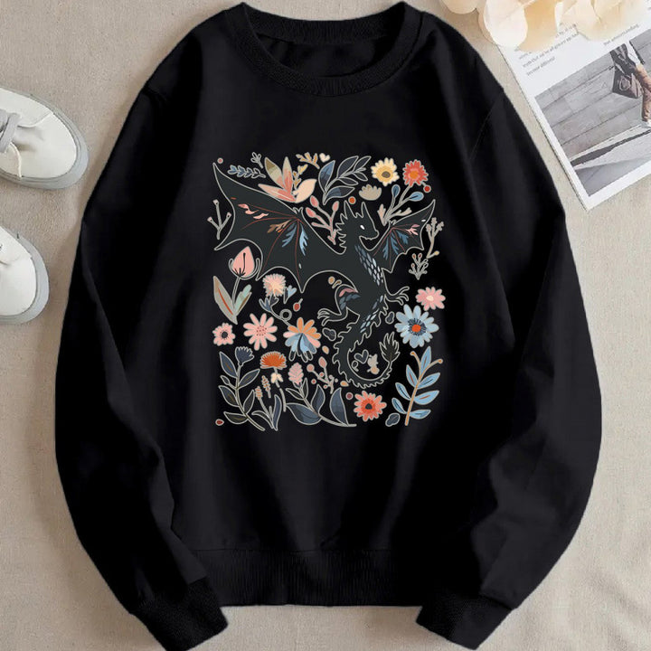 Kvinnors sweatshirt med detaljerad drake- och blommotiv Mirla-Eva Jonsson