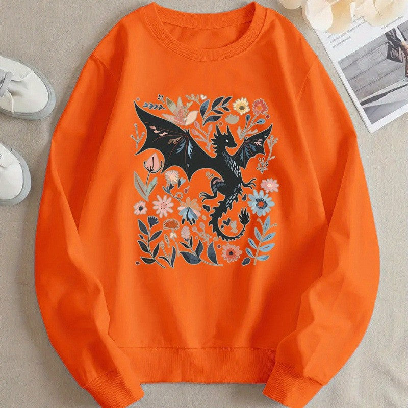 Kvinnors sweatshirt med detaljerad drake- och blommotiv Mirla-Eva Jonsson
