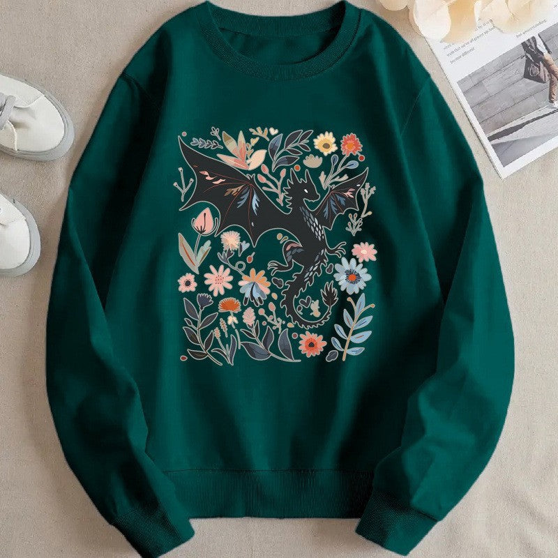 Kvinnors sweatshirt med detaljerad drake- och blommotiv Mirla-Eva Jonsson