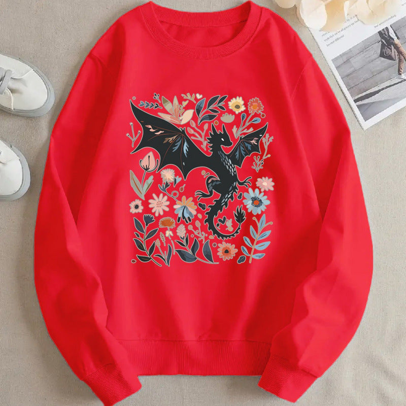 Kvinnors sweatshirt med detaljerad drake- och blommotiv Mirla-Eva Jonsson