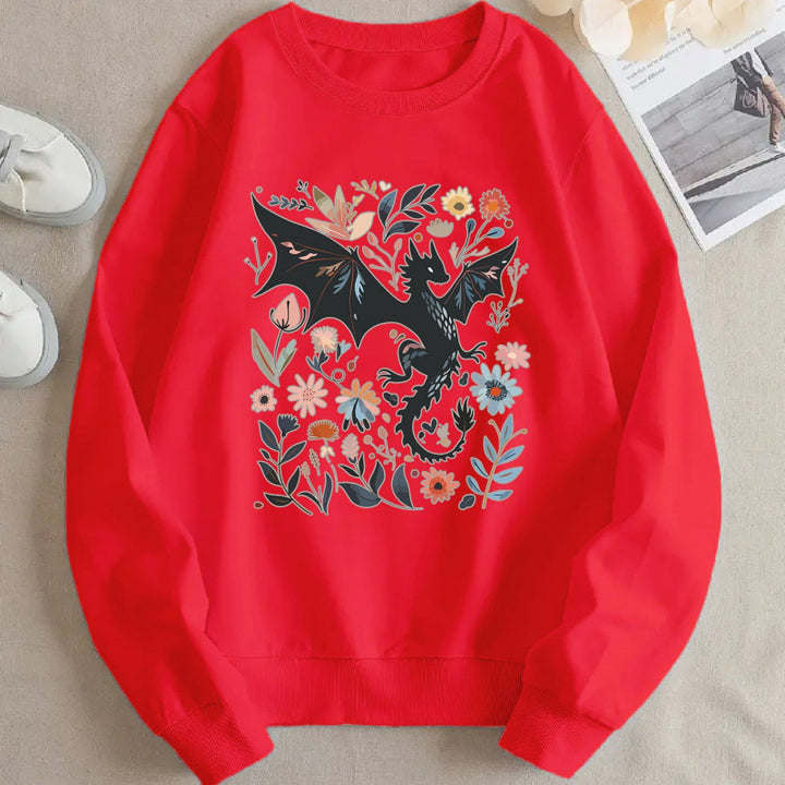 Kvinnors sweatshirt med detaljerad drake- och blommotiv Mirla-Eva Jonsson