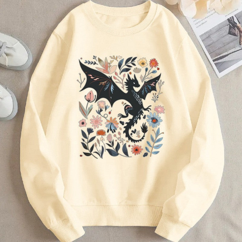 Kvinnors sweatshirt med detaljerad drake- och blommotiv Mirla-Eva Jonsson