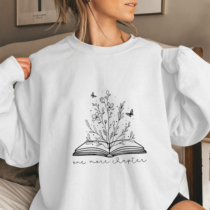 Kvinnors sweatshirt med elegant blommönster och inspirerande tryck Mirla-Eva Jonsson