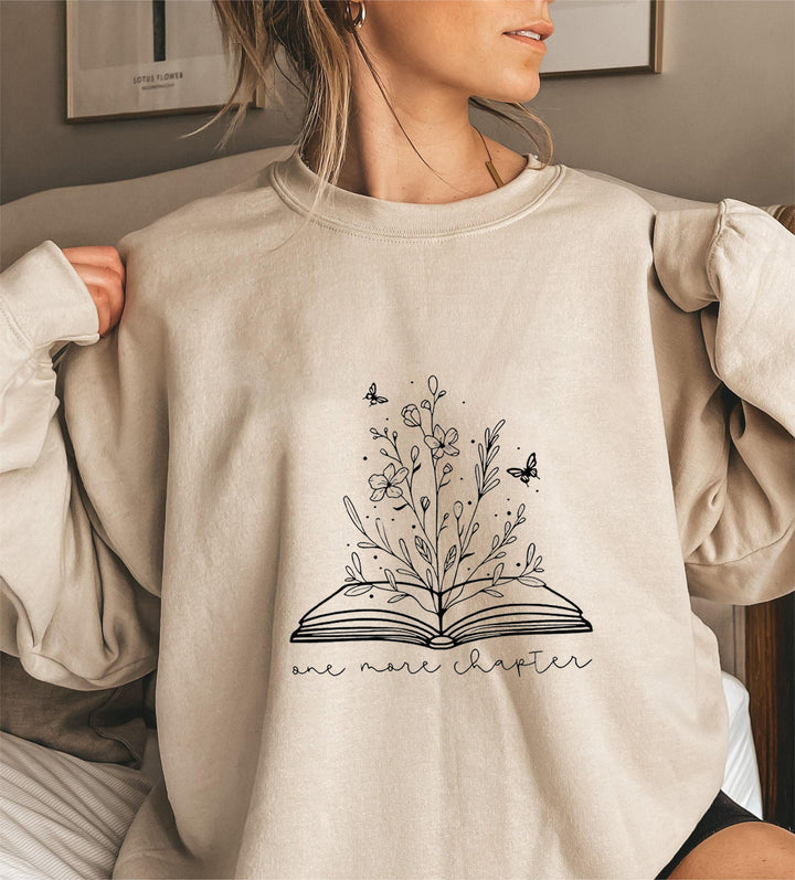 Kvinnors sweatshirt med elegant blommönster och inspirerande tryck Mirla-Eva Jonsson