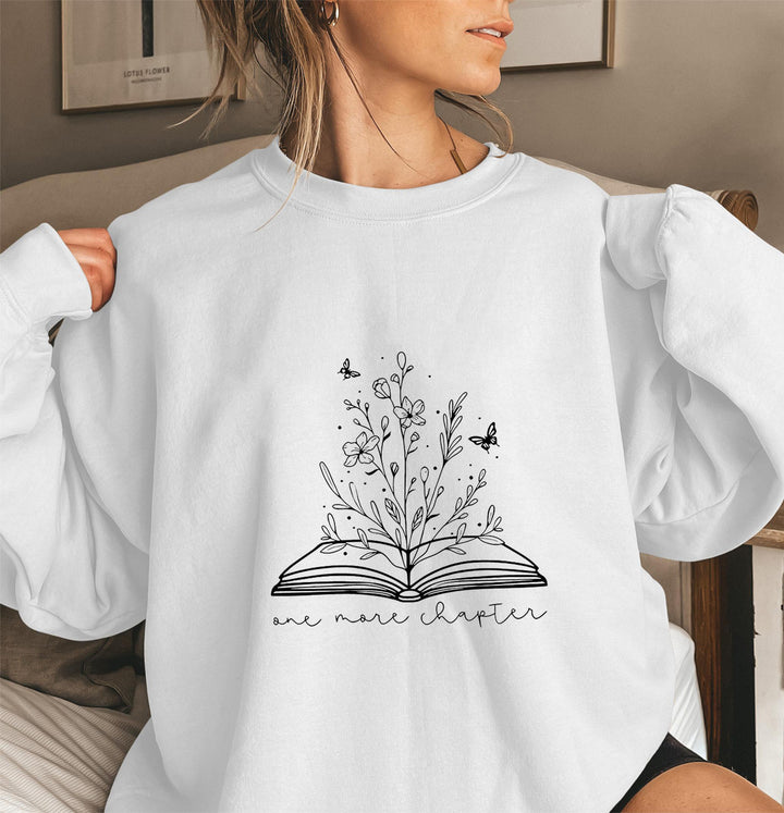Kvinnors sweatshirt med elegant blommönster och inspirerande tryck Mirla-Eva Jonsson