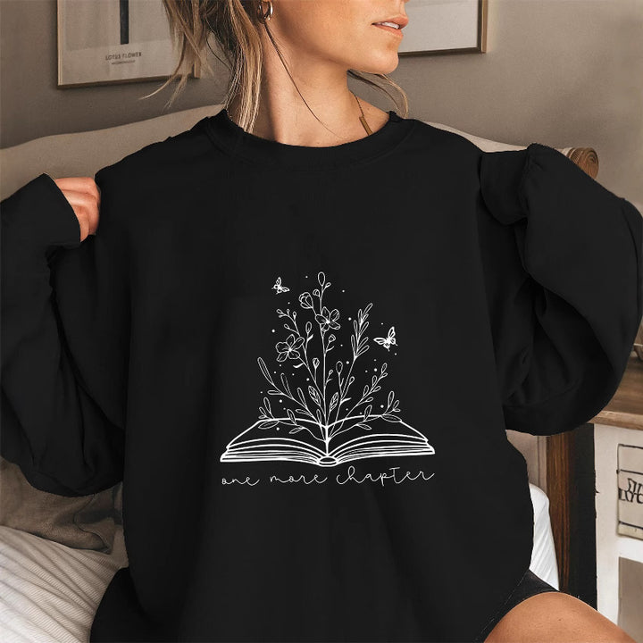 Kvinnors sweatshirt med elegant blommönster och inspirerande tryck Mirla-Eva Jonsson