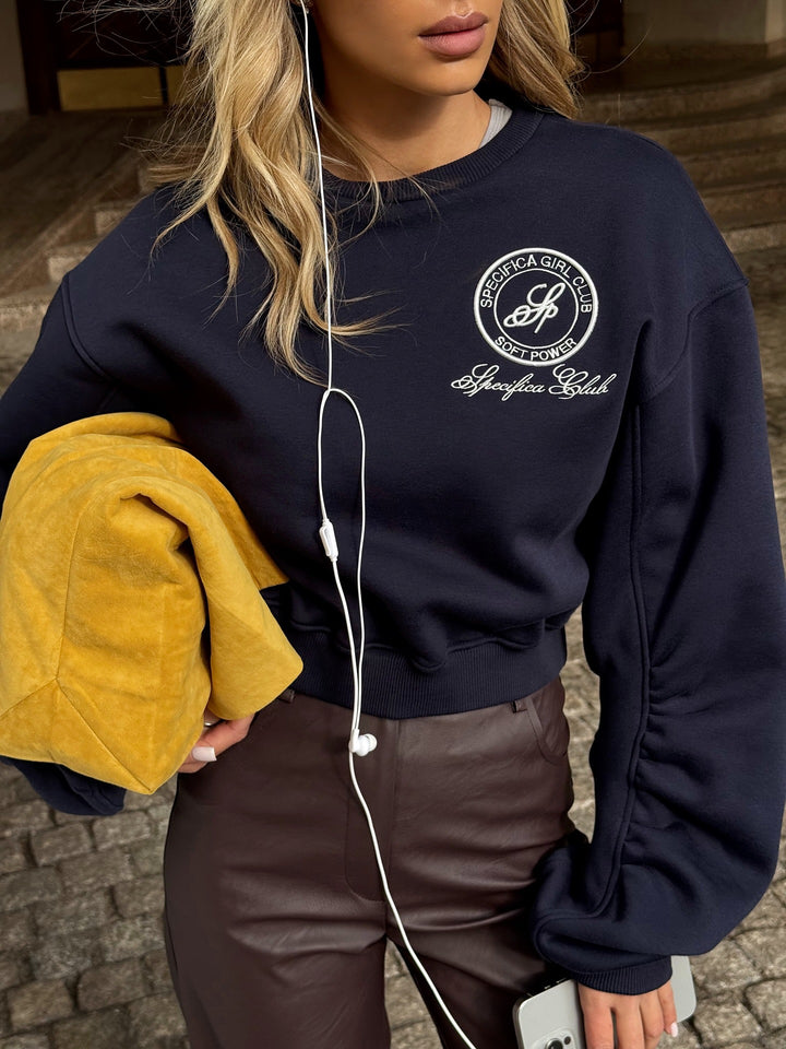 Kvinnors sweatshirt med eleganta puffärmar och högkvalitativ broderi Mirla-Eva Jonsson
