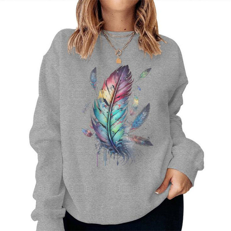 Kvinnors sweatshirt med färgglad fjädersdesign och avslappnad passform Mirla-Eva Jonsson