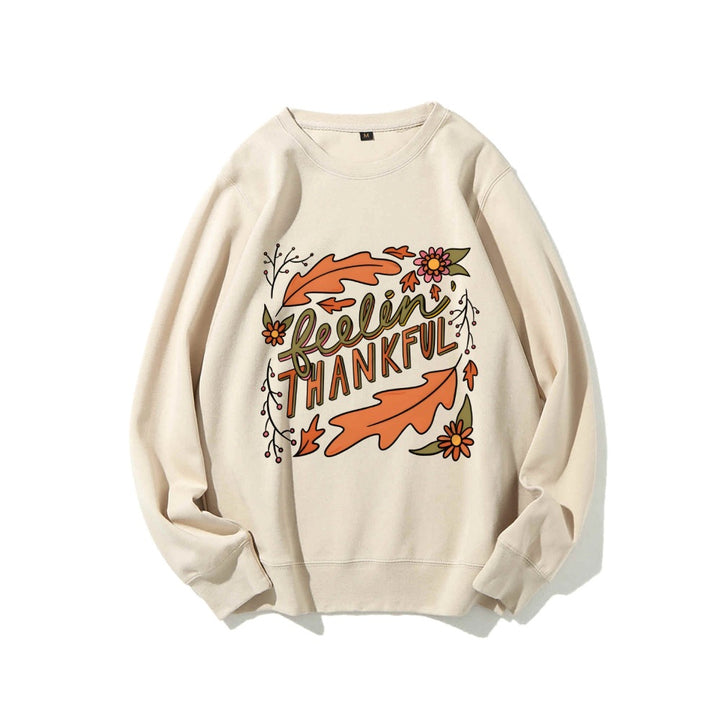 Kvinnors sweatshirt med färgglad höstmotiv och inspirerande text Mirla-Eva Jonsson