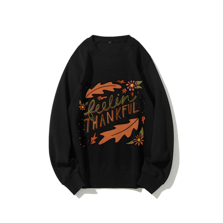 Kvinnors sweatshirt med färgglad höstmotiv och inspirerande text Mirla-Eva Jonsson
