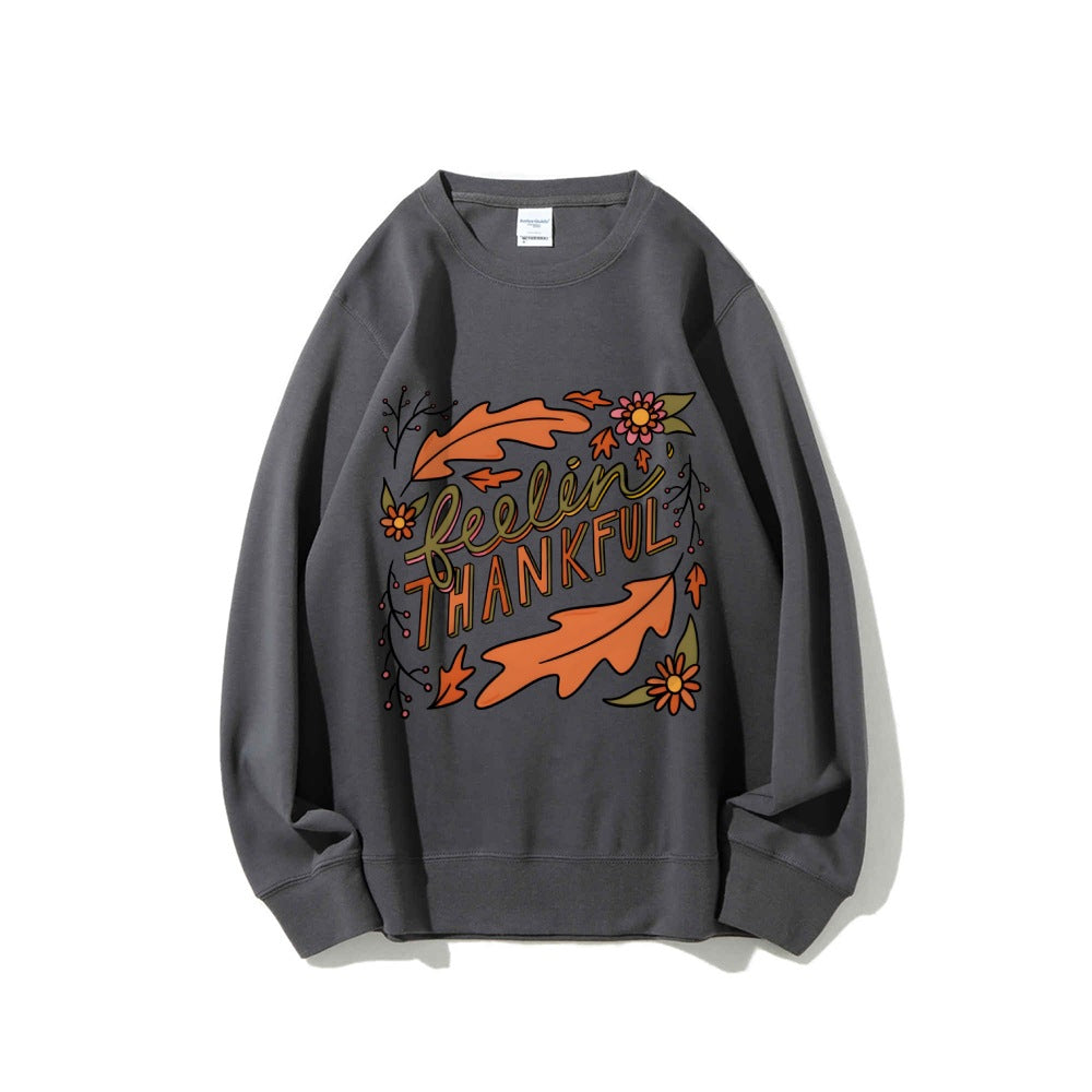 Kvinnors sweatshirt med färgglad höstmotiv och inspirerande text Mirla-Eva Jonsson