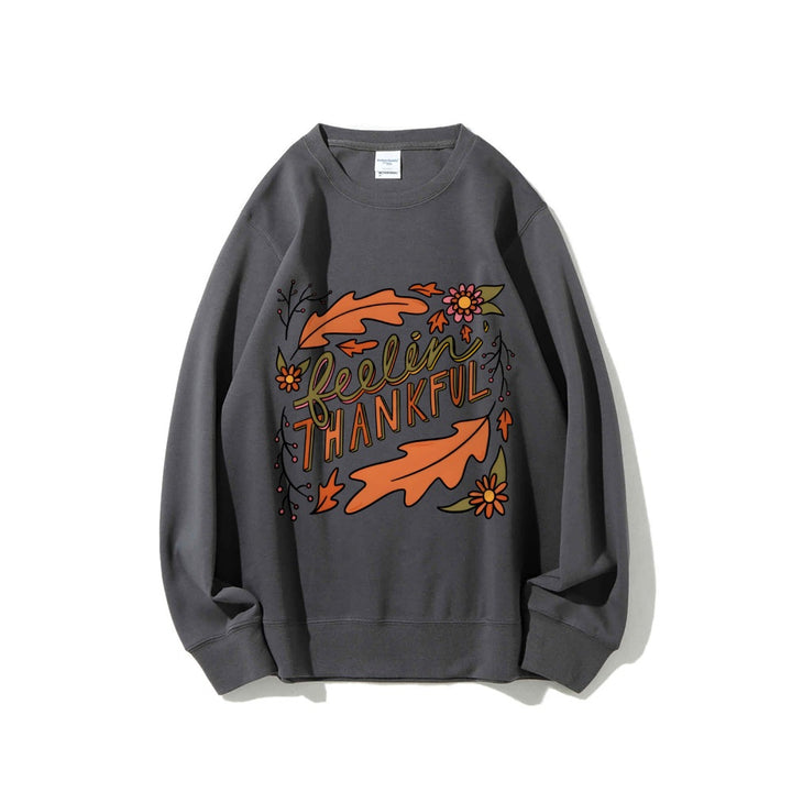 Kvinnors sweatshirt med färgglad höstmotiv och inspirerande text Mirla-Eva Jonsson