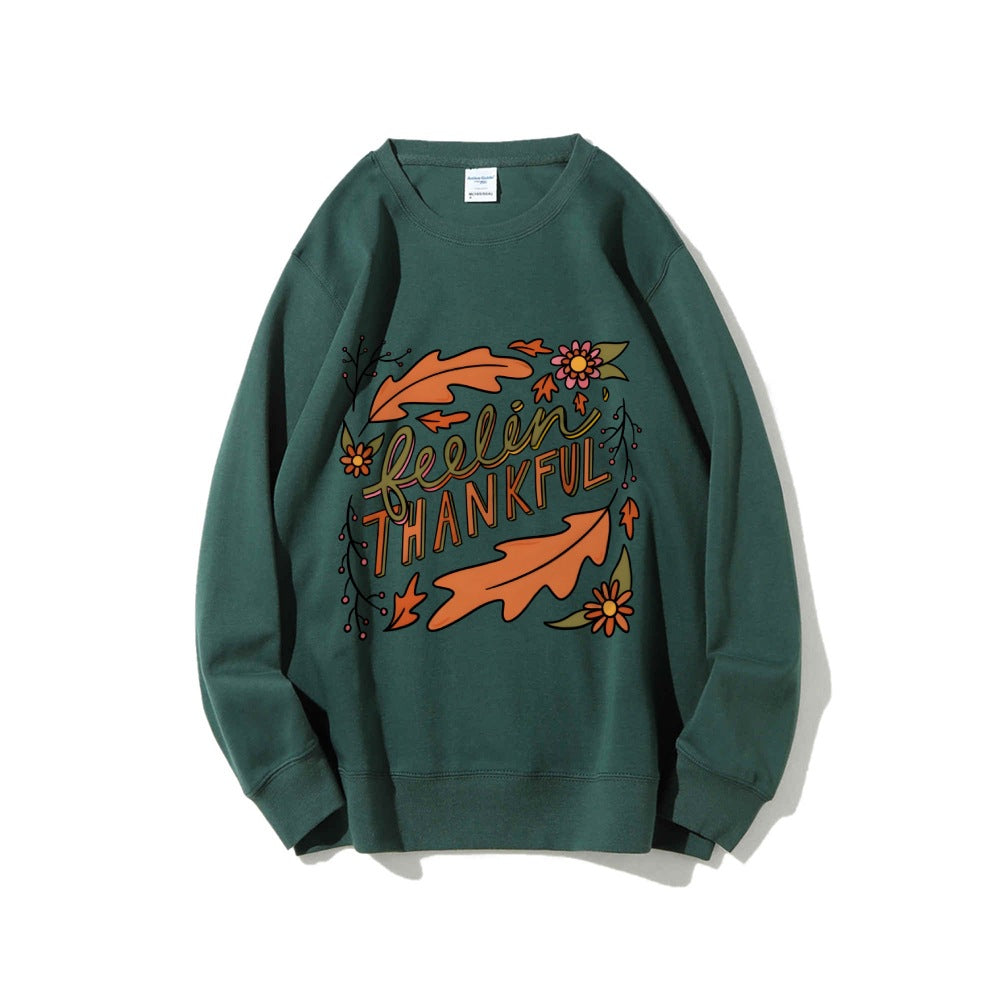 Kvinnors sweatshirt med färgglad höstmotiv och inspirerande text Mirla-Eva Jonsson