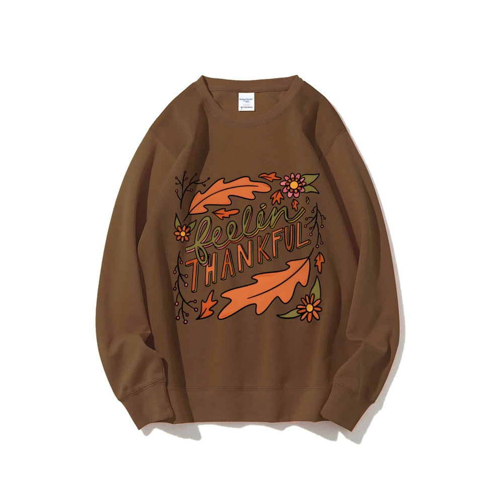 Kvinnors sweatshirt med färgglad höstmotiv och inspirerande text Mirla-Eva Jonsson