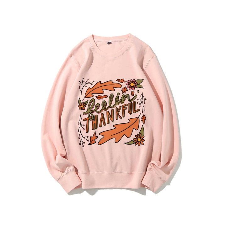 Kvinnors sweatshirt med färgglad höstmotiv och inspirerande text Mirla-Eva Jonsson