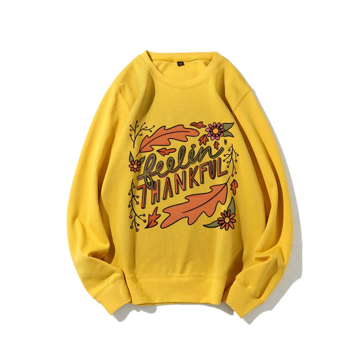 Kvinnors sweatshirt med färgglad höstmotiv och inspirerande text Mirla-Eva Jonsson