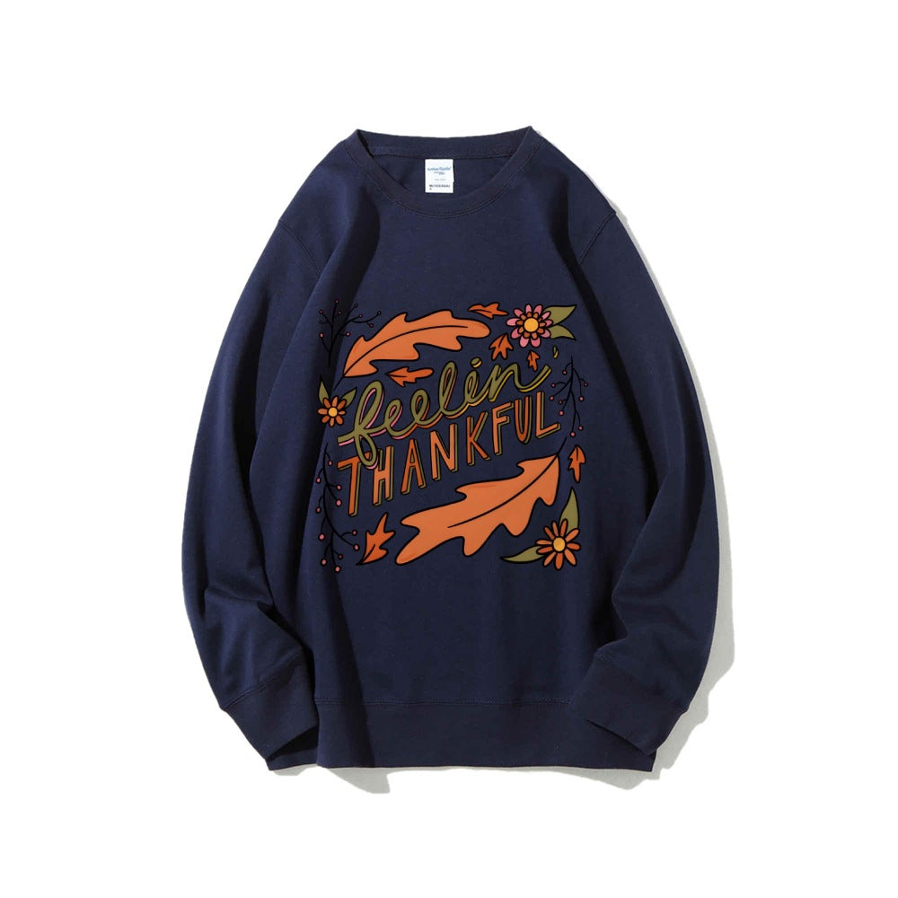 Kvinnors sweatshirt med färgglad höstmotiv och inspirerande text Mirla-Eva Jonsson