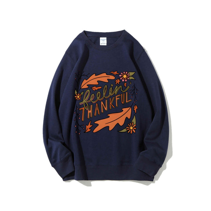 Kvinnors sweatshirt med färgglad höstmotiv och inspirerande text Mirla-Eva Jonsson