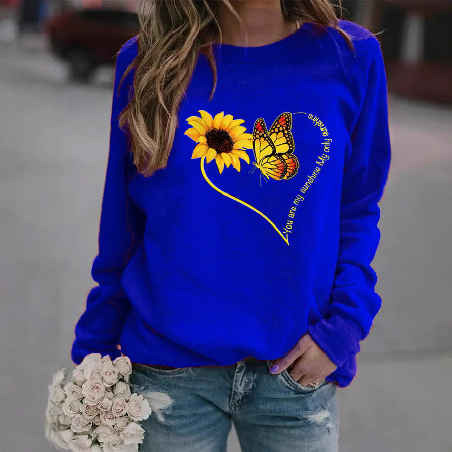Kvinnors sweatshirt med grafisk fjäril och solrosmotiv Mirla-Eva Jonsson