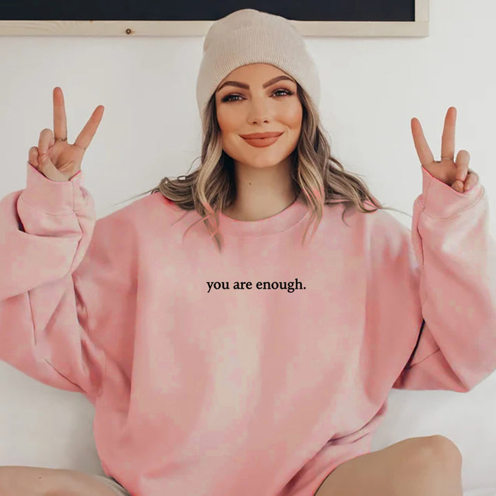 Kvinnors sweatshirt med inspirerande design och bekväm passform Mirla-Eva Jonsson