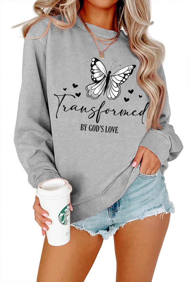 Kvinnors sweatshirt med konstnärlig fjärilsmotiv och inspirerande slogan Mirla-Eva Jonsson