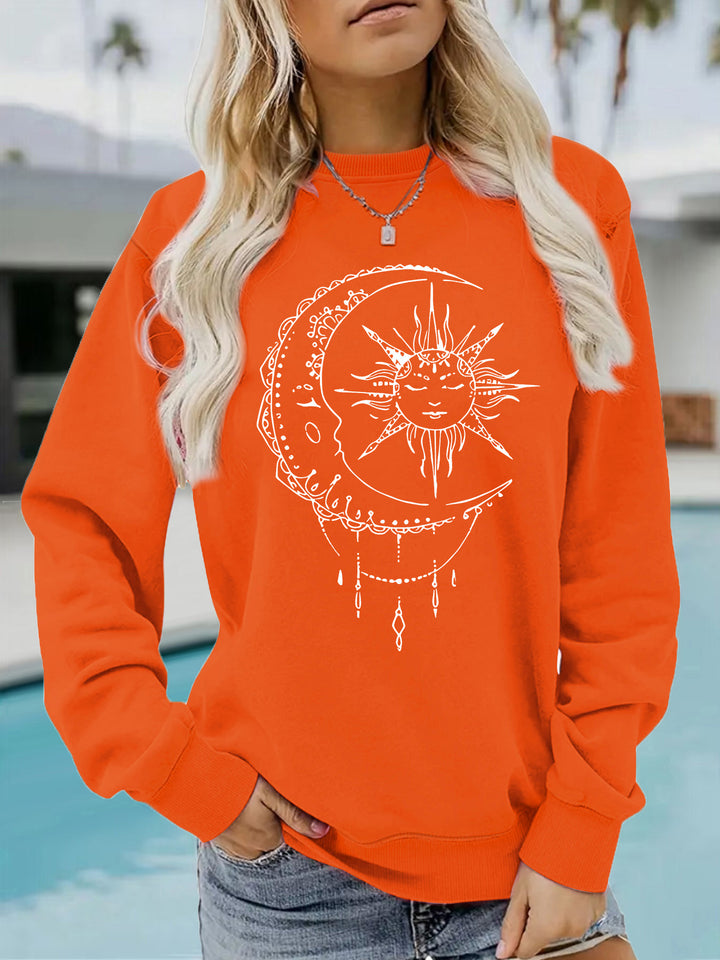 Kvinnors sweatshirt med konstnärlig sol- och måndesign Mirla-Eva Jonsson