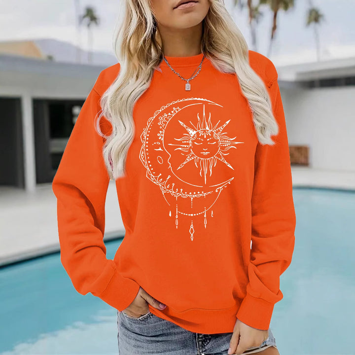 Kvinnors sweatshirt med konstnärlig sol- och måndesign Mirla-Eva Jonsson