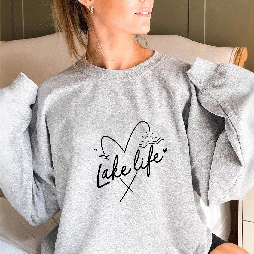 Kvinnors sweatshirt med korta ärmar och hjärtmotiv Mirla-Eva Jonsson
