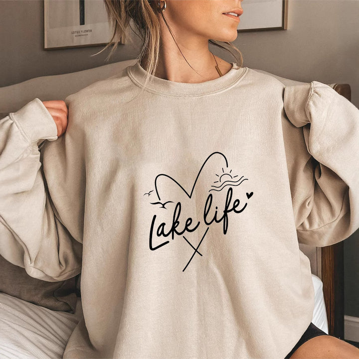 Kvinnors sweatshirt med korta ärmar och hjärtmotiv Mirla-Eva Jonsson