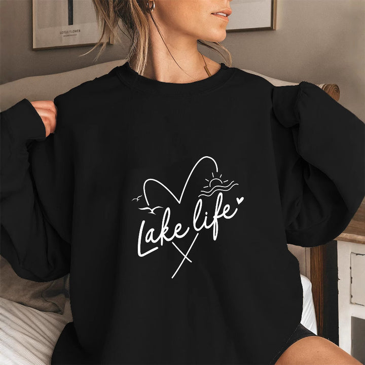 Kvinnors sweatshirt med korta ärmar och hjärtmotiv Mirla-Eva Jonsson